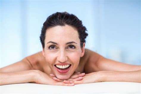 Smiling Brunette Relaxing On Massage Table Stock Image Image Of