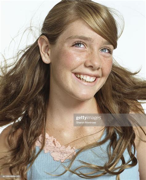 Teenage Girl Looking Up Smiling Closeup High Res Stock Photo Getty Images
