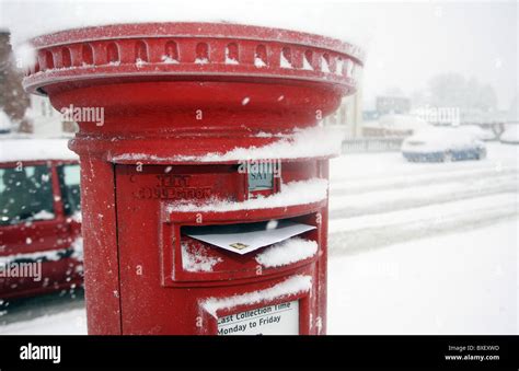 Red Post Box Covered Snow Hi Res Stock Photography And Images Alamy