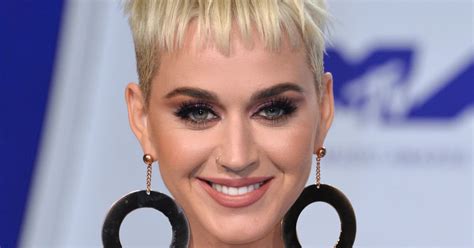 Katy Perry Flaunts Major Cleavage In Denim Dress