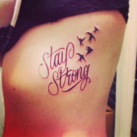 Stay Strong Tattoo On The Ribs