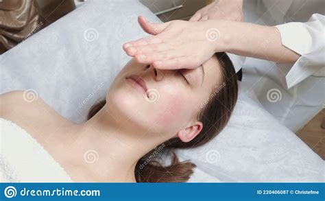 Brunette Woman Gets A Facial Massage Course In Salon Stock Image Image Of Relax Health 220406087