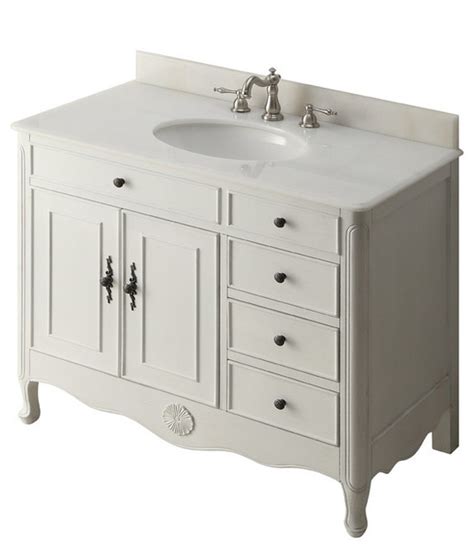 Clean lines contrast the turned legs and curved toe kick to create a design that matches a variety of décor styles. 38" Daleville Distressed White Bath Vanity - Traditional - Bathroom Vanities And Sink Consoles ...