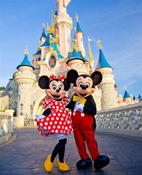Minnie And Mickey Mouse At Sleeping Beauty Castle In Disneyland Paris