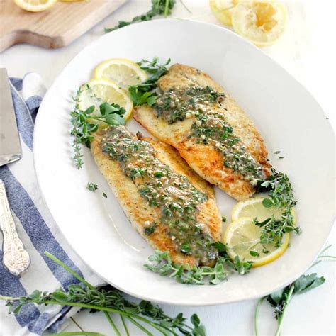 Pan Fried Sea Bass With Lemon Garlic Herb Sauce Recipe Sea Bass Recipes Recipes Herb Sauce