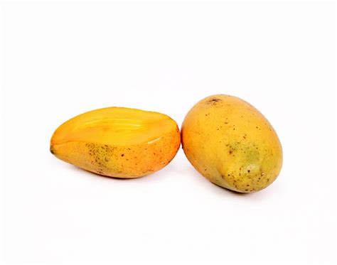 One Sliced Mango And One Mango On White Background High Quality Free Stock Images