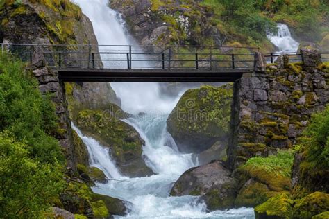 Waterfall And Bridge In Green Mountains Stock Photo Image Of Cascade