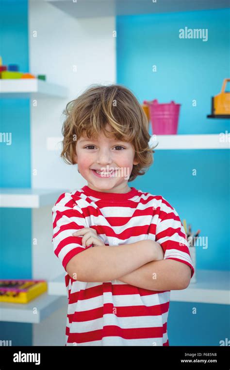 Happy Boy With Folded Arms Stock Photo Alamy