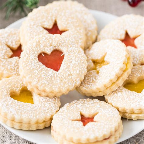 We used linzer cookie cutters. Waw wee: Austrian Cookies Recipe : Traditional Linzer Cookies Plated Cravings : This recipe is ...