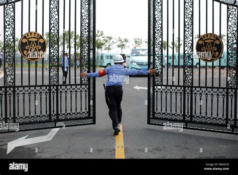 File A Security Guard Opens The Gate Of Wellington College