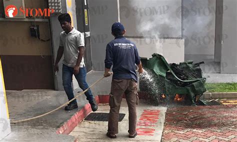 workers and scdf extinguish rubbish chute fire at anchorvale link