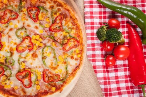 Close Up Of Delicious Italian Pizza With Vegetables And Cheese Stock