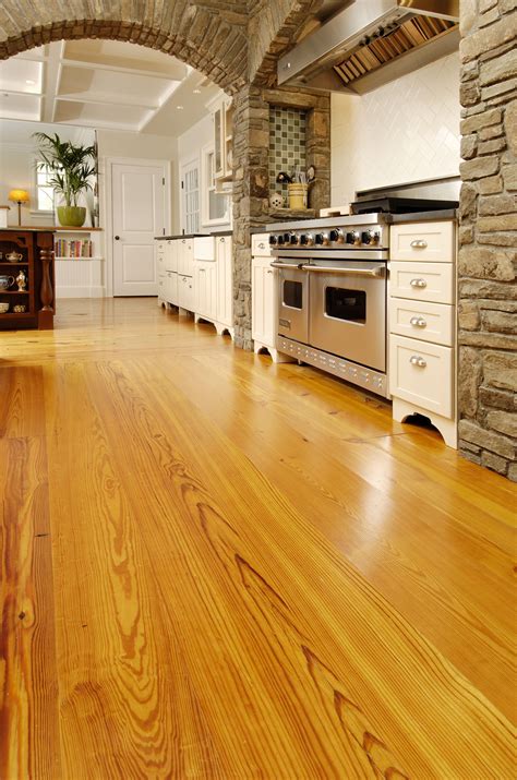 Inspect all tiles before installation. Reclaimed Heart Pine Floors in Stone Kitchen