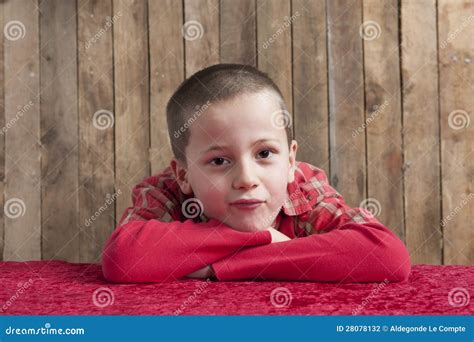 Little Boy Head Resting On His Arms Stock Photo Image Of Portrait