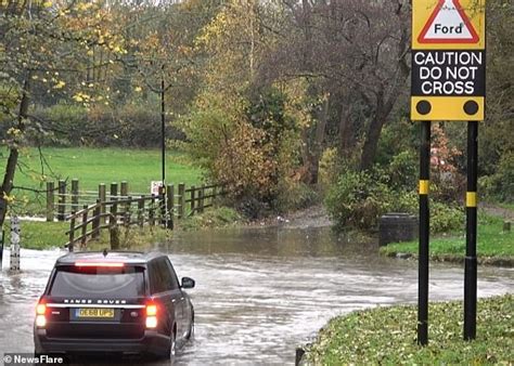 No, he's the guy who teaches the cops how to drive. Range Rover driver ignores flashing 'do not cross' signs ...