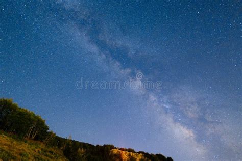 The Starry Sky And The Milky Way Over The Mountains And The Fore Stock