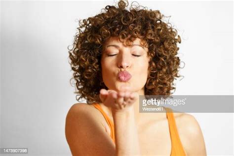 female blowing kiss photos and premium high res pictures getty images