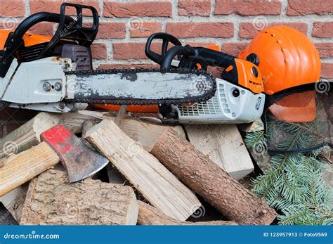 Gasoline Driven Chain Saw On A Wooden Stack Stock Image Image Of