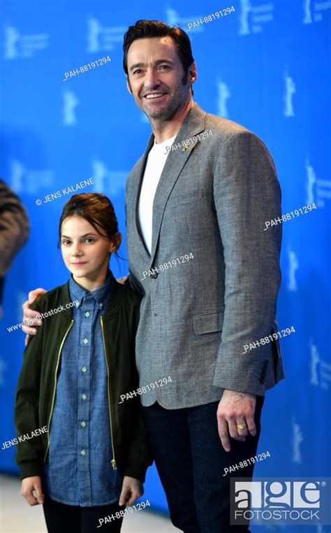 Actors Dafne Keen And Hugh Jackman Pose During A Photo Call For The Movie Logan At The 67th
