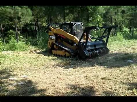 You can easily attach your mulcher to your skid steer, and you'll be ready to perform mulching on wooded terrain and even in confined spaces. CAT 299D XHP w/CAT/FAE HM 315 mulcher. - YouTube