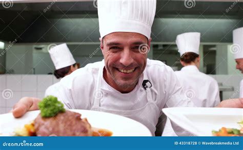 Happy Chef Showing Two Dishes To Camera Stock Footage Video Of Whites