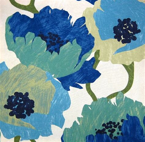 Blue And Green Flowers Painted On White Paper