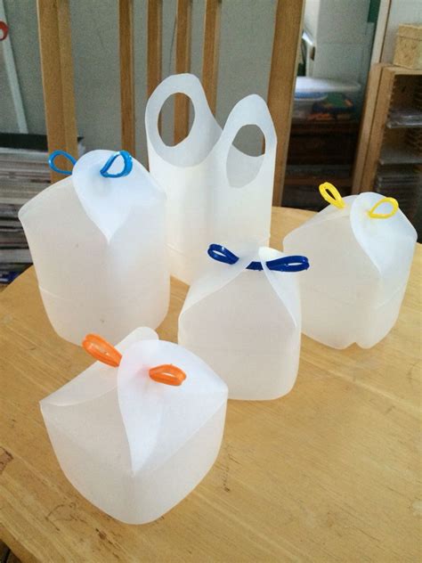 Milk Bottle Boxes Fastened With The Plastic Ring From Around The Bottle