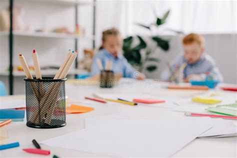 Selective Focus Of Adorable Kids Drawing Pictures At Table Stock Image