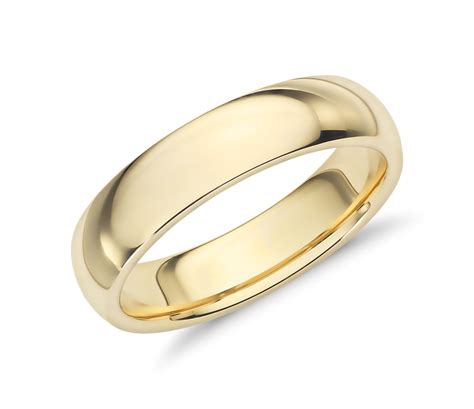 Only 3 available and it's in 2 people's carts. Comfort Fit Wedding Band in 18k Yellow Gold (5mm) | Blue Nile