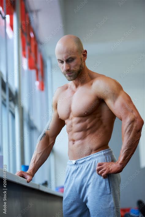 Brutal Shirtless Shaved Head Muscular Male Foto Stok The Best Porn Website