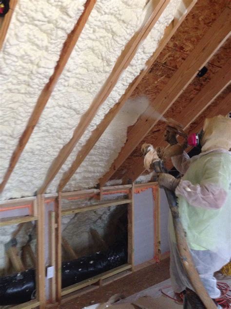 Spray Foam Insulation Installed In Older House To Save On Energy