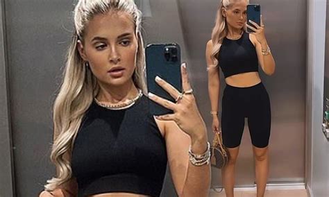 Molly Mae Hague Showcases Her Toned Midriff In A Black Crop As She