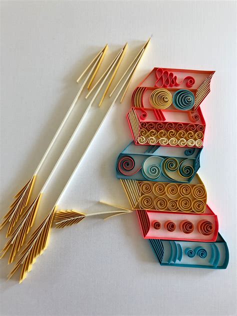 Quilled Letter A Books And Arrows Fita De Papel Arte