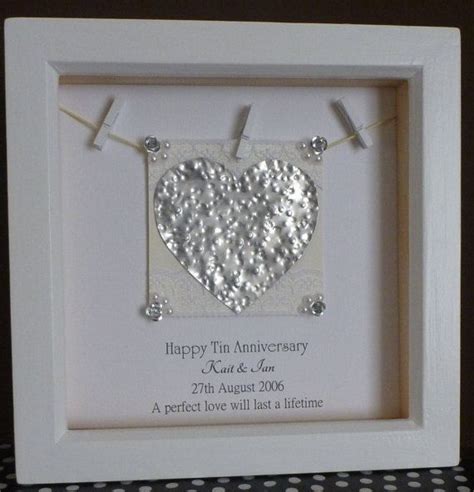Each anniversary, hold the picture from the year before. Ten Year Wedding Anniversary Ideas