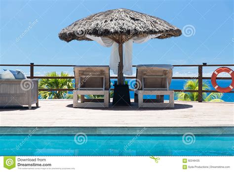 Palapa And Sunbeds At Seaside Swimming Pool Stock Image Image Of