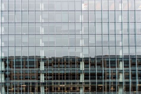 Premium Photo Glass Office Building Facade With Windows Texture