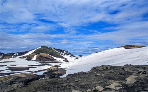 Colorful Rhyolite Mountains Covered With Snow In Jokultungur Geothermal