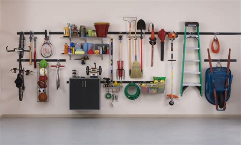 It may be as simple as with a combination of shelving, locks, baskets and other accessories, garage wall organization systems. Affordable Garage Organization: Get on the "FastTrack ...