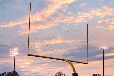American Football Goal Posts Against Sunset Football Goal Posts