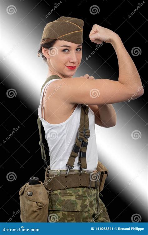 Young Woman Dressed In Us Wwii Military Uniform Show Her Biceps Stock