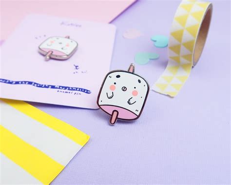 D E S C R I P T I O N A Kawaii Marshmellow Enamel Pin For All My