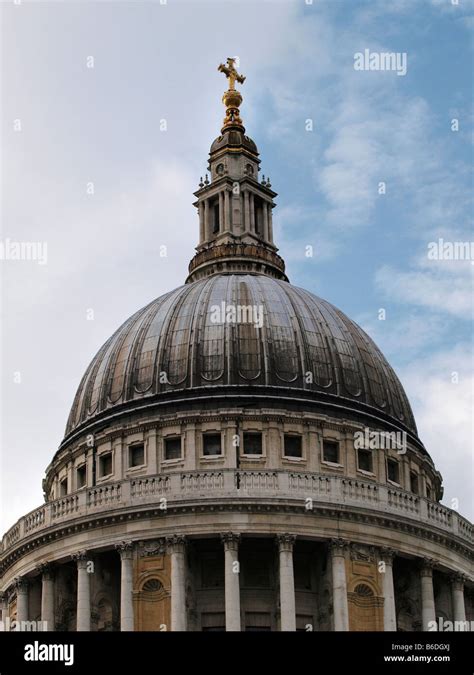The Large Dome Of Saint Pauls Cathedral With Golden Cross On Top London