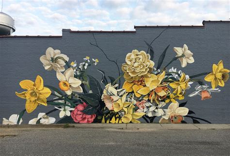 Bursts Of Stylized Flowers By Ouizi Transform Buildings Into Floral