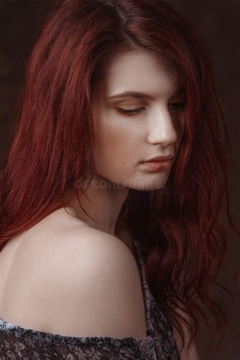 Dramatic Retro Portrait Of A Young Beautiful Dreamy Redhead Woman Soft
