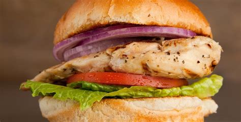 This burger is light on calories without sacrificing flavor! Grilled Chicken Burger | Trenta Pizza Restaurant