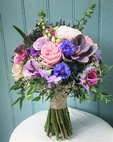 scottish theme bridal bouquet with succulent foxglove cornflower ammi and roses wildflower