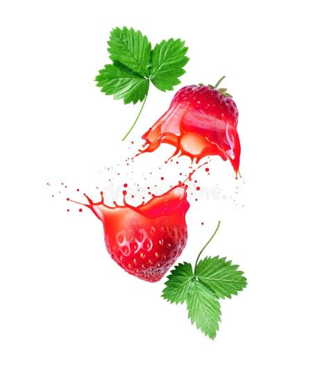 Strawberry Cut Into Two Halves With Splashes Of Juice Closeup Stock
