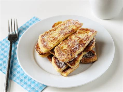 Dip bread in egg mixture, allowing it to soak in slightly. SUGAR DIPPED FRENCH TOAST FINGERS. | Gathering Beauty