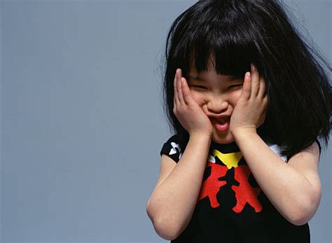 Pinch Cheeks Kid Stock Photos Pictures And Royalty Free Images Istock