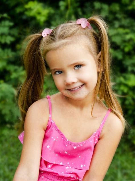 Outdoor Portrait Of Smiling Little Girl Stock Photo Image Of Park